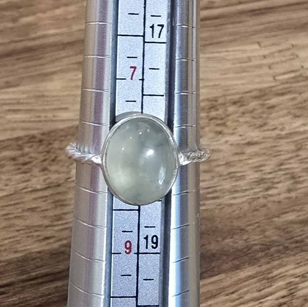Simple single stone ring